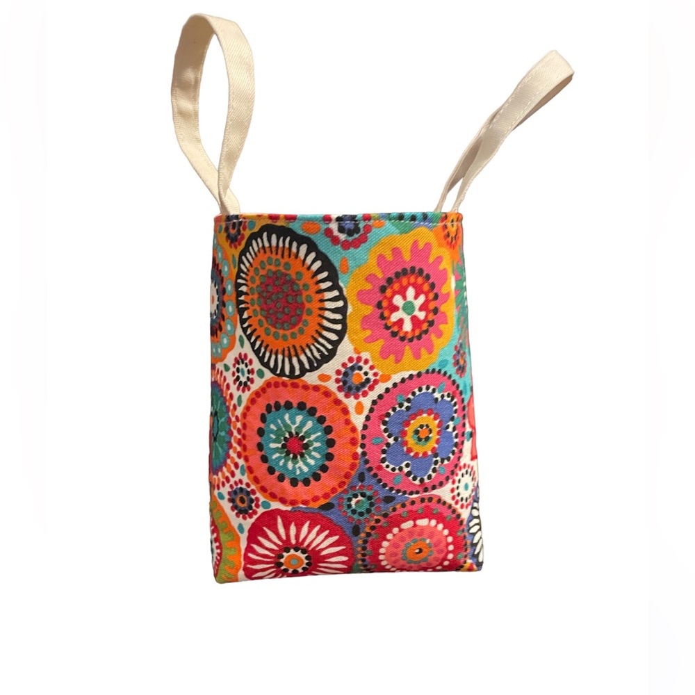 Unique small canvas bag. Multicolored. Approximate size is  7 1/2 H x 7 1/2” W